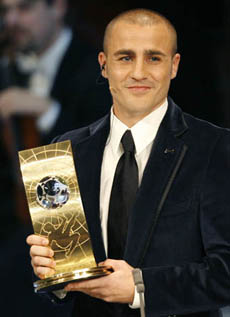 Cannavaro of Italy shows his trophy during the FIFA World Player Gala in Zurich